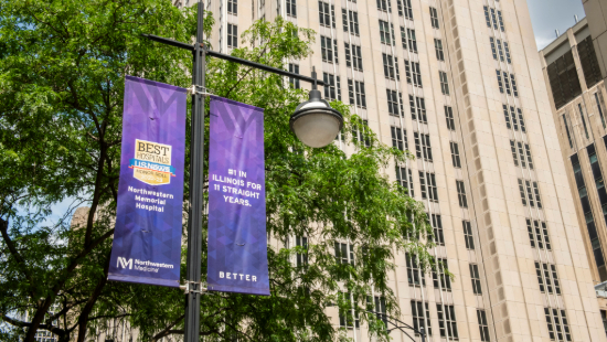 NM purple banner displayed across buildings