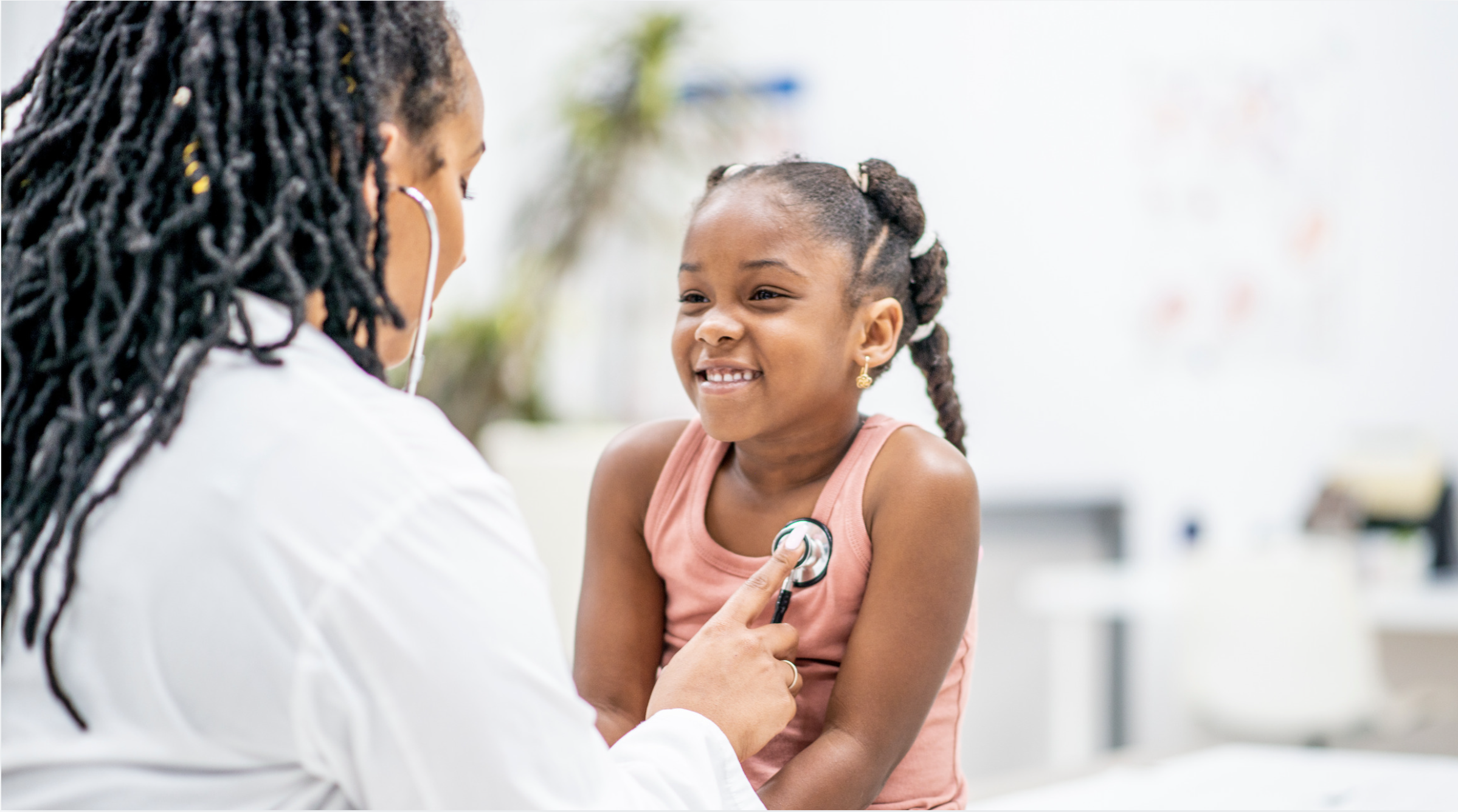 Dr listening to pediatric patient heartbeat with stethoscope 