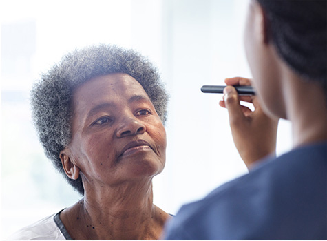 Woman receiving eye exam