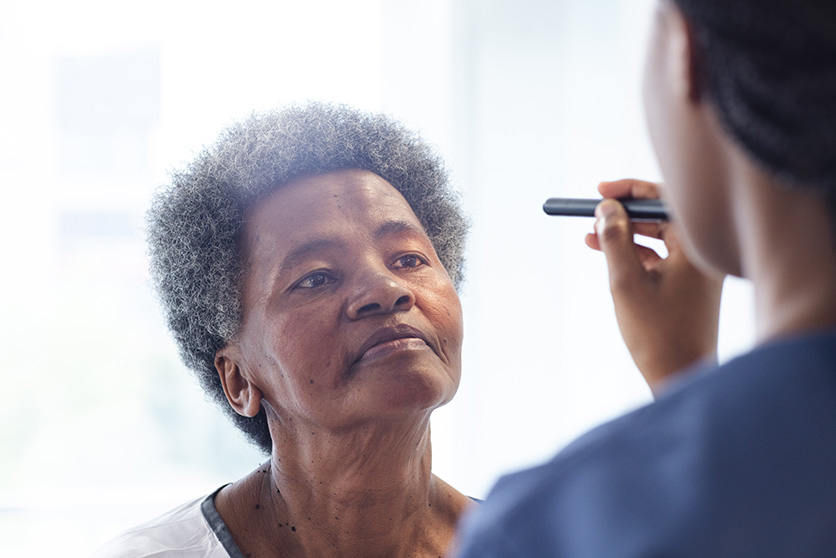 woman receiving eye exam