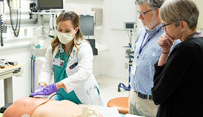 Doctors demonstrating a hospital simulation exercise