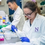 two people working at a lab bench